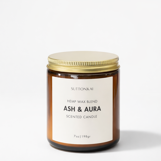 Suttonkai candle with 'Ash & Aura' scent on a white background