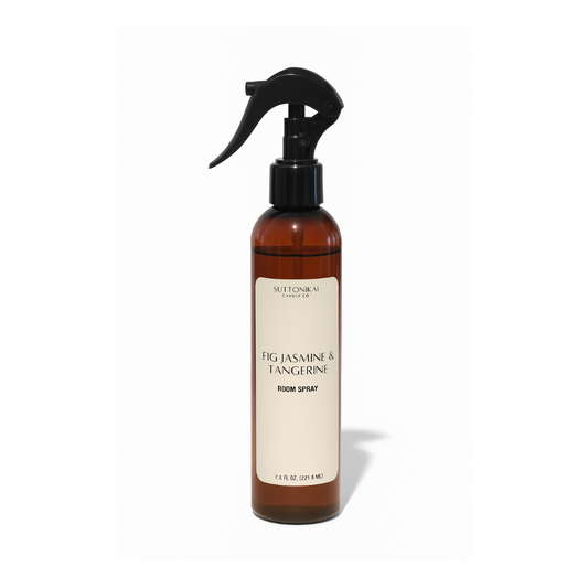 Brown spray bottle with a label on a white background