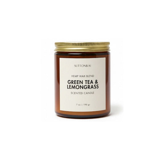 Candle jar labeled 'Green Tea & Lemongrass' on a white background