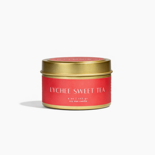 Lychee Sweet Tea Wooden Wick Candle | Fresh Floral & Tea Scent candle tin with gold lid on a white background