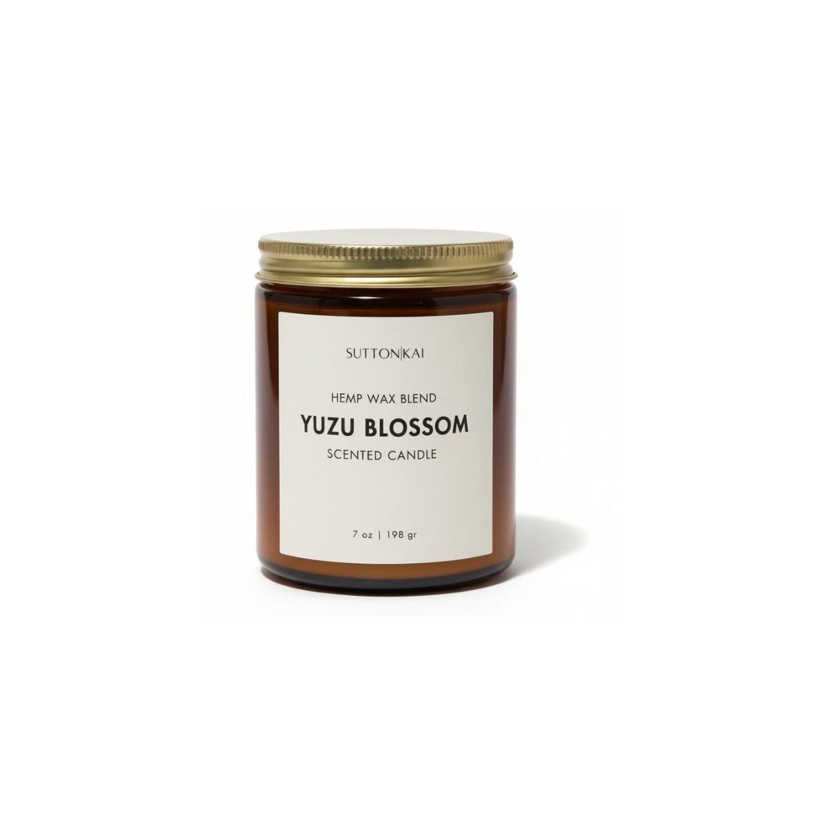 Yuzu Blossom scented candle with a white label on a white background