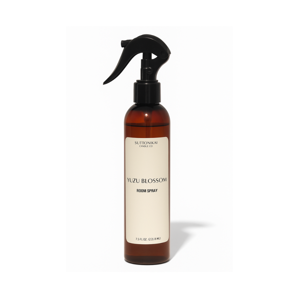 Brown spray bottle with a label on a white background