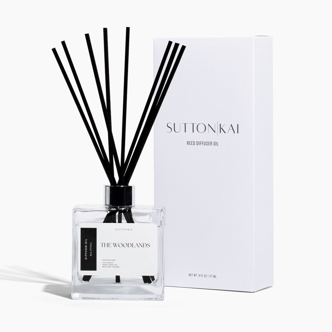 Sutton Kai diffuser bottle with black sticks and packaging on a white background
